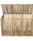 Coffre LINE tressé utilisé verticalement comme rangement de bureau avec anses en fibre naturelle