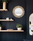 Miroir Mural Rond Tressé en Raphia Naturel dans un salon bohéme COSYDAR
