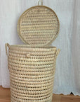 Round wicker laundry basket with lid