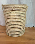 Round wicker laundry basket with lid