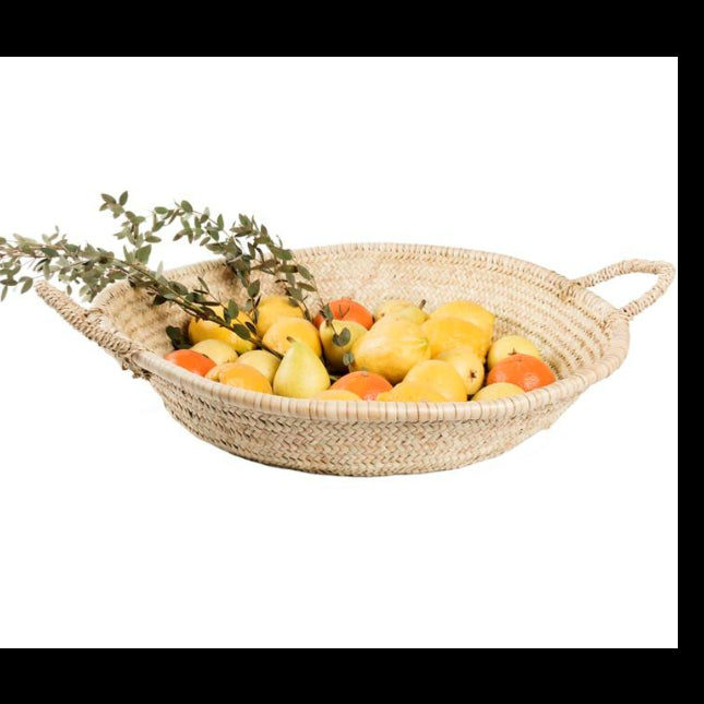 Panier rond tressé en feuille de palmier utilisé comme corbeille à fruits – COSYDAR