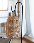 lampadaire support et suspension en fibres naturelles mis en situation dans un salon COSYDAR