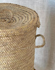 Panier à linge rond en feuille de palmier avec couvercle