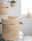 Panier à linge tressé en feuille de palmier