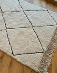 Tapis Berbére en laine mis en situation sur un parquet